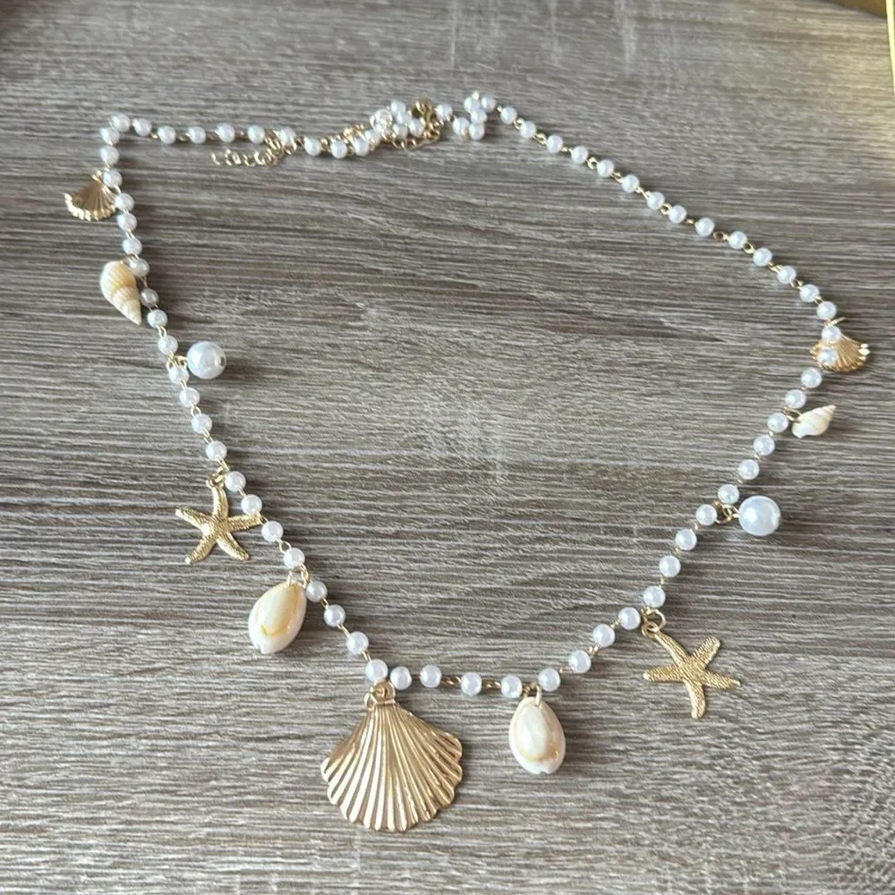 Anthropologie elegant gold